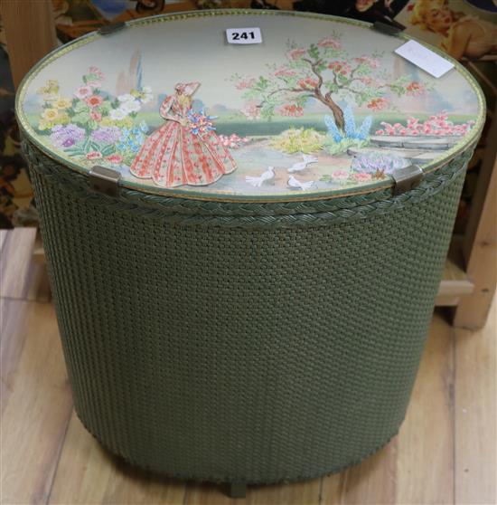 A 1920s Lloyd Loom style box with embroidered top